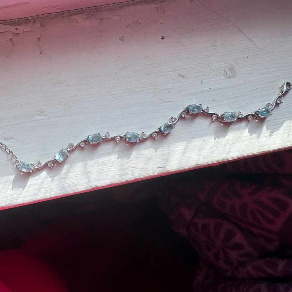 Elegant Silver Bracelet with Blue Gemstones
